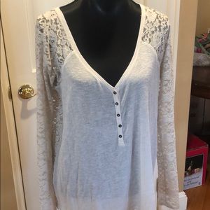 Off-white sweater with lace sleeves and lace back